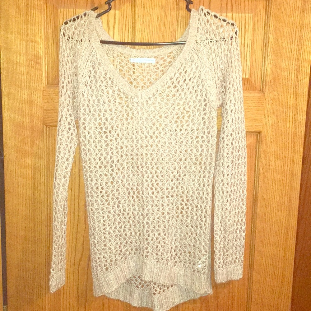 V-neck Tan/sparkles Maurice’s long sleeve shirt.